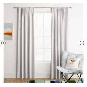 Room Essentials room darkening rod pocket panel curtains in white